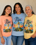 Lighthouse "Be the Light" Tee — Inspirational Coastal Sunset T-Shirt